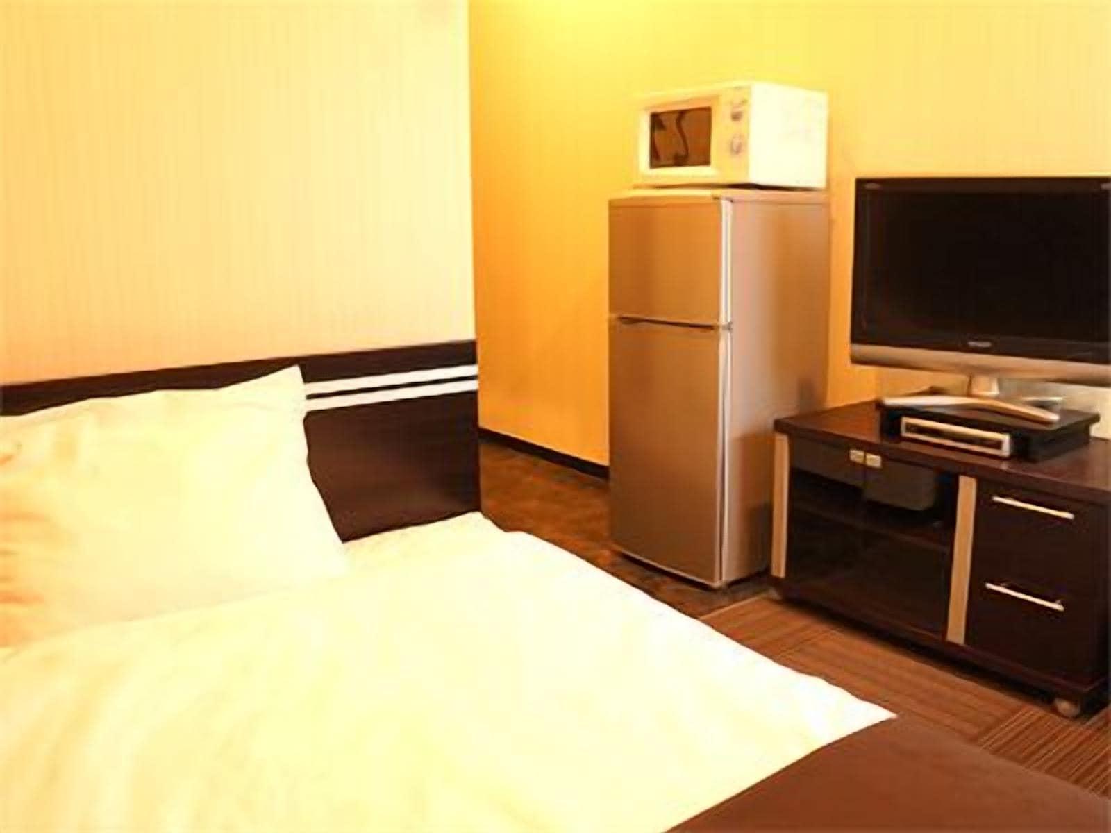 Hotel Livemax Budget Esaka Suita Exteriör bild