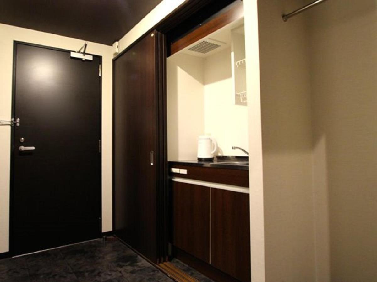 Hotel Livemax Budget Esaka Suita Exteriör bild