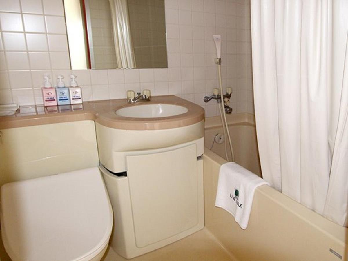 Hotel Livemax Budget Esaka Suita Exteriör bild