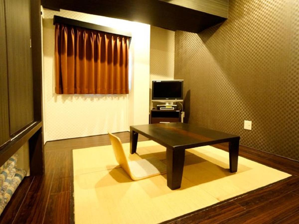 Hotel Livemax Budget Esaka Suita Exteriör bild