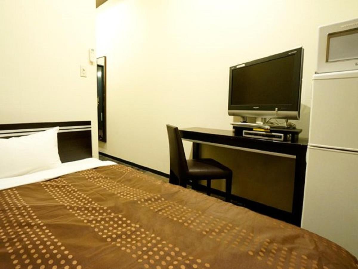 Hotel Livemax Budget Esaka Suita Exteriör bild