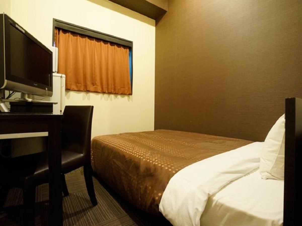 Hotel Livemax Budget Esaka Suita Exteriör bild