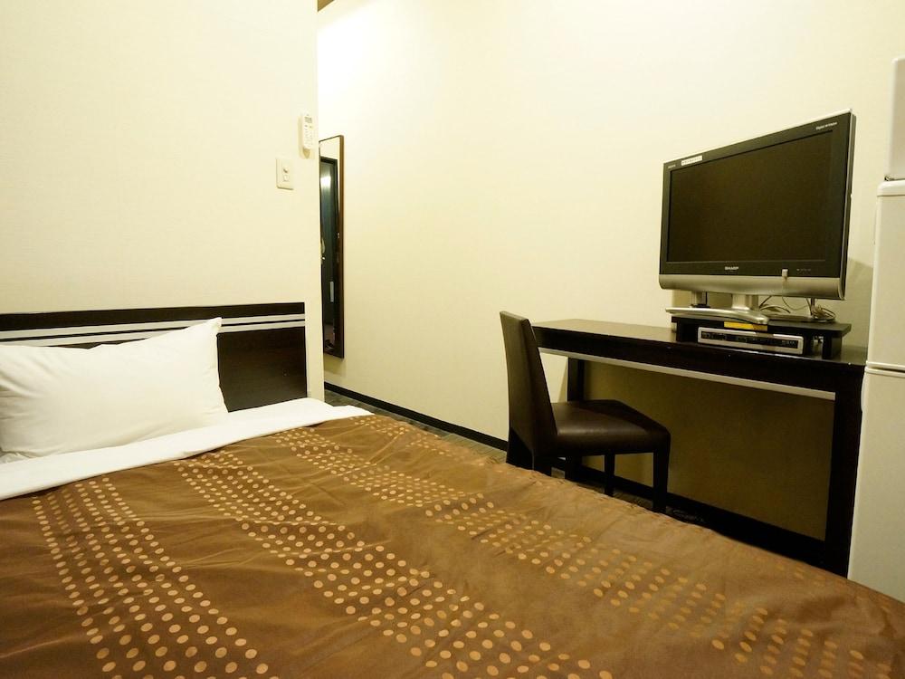 Hotel Livemax Budget Esaka Suita Exteriör bild