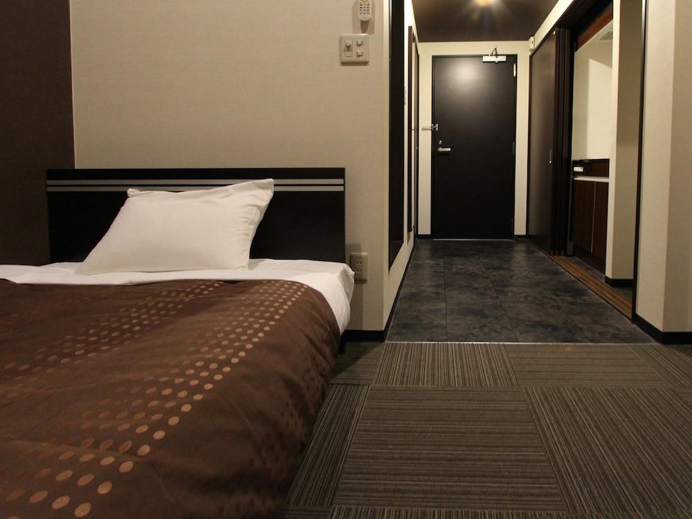Hotel Livemax Budget Esaka Suita Exteriör bild