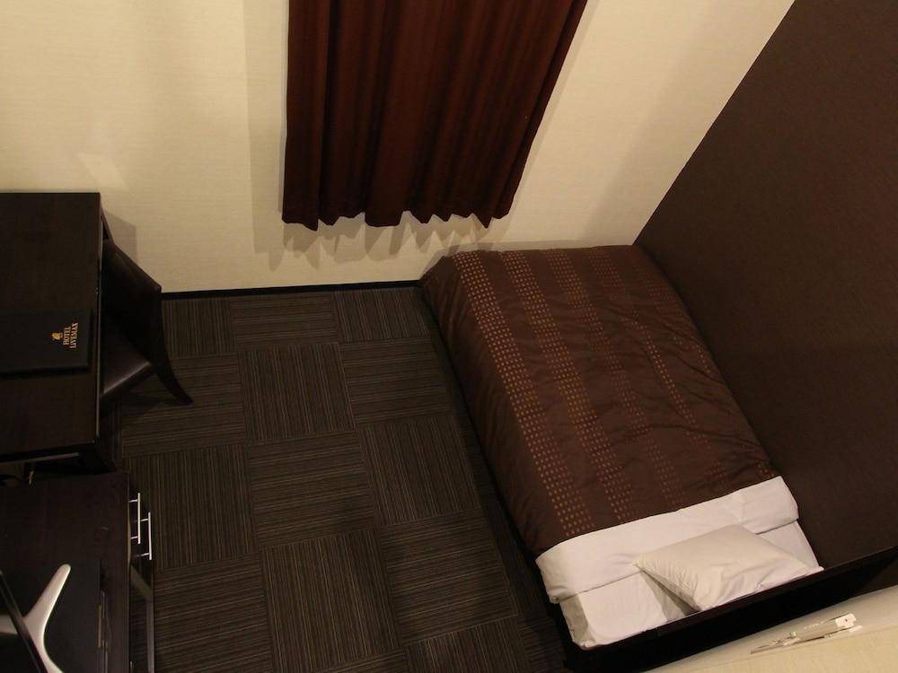 Hotel Livemax Budget Esaka Suita Exteriör bild